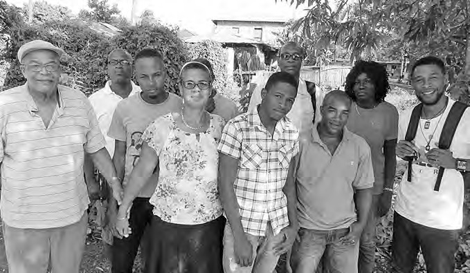Group of ecclesial representatives and visitors standing outdoors